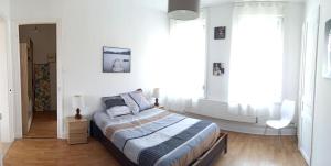 Appartements Magnifique T3 avec parking gratuit proche et WIFI : photos des chambres