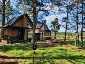 Domki letniskowe Leśne Spa Borsk nad Jeziorem Wdzydzkim BASEN SAUNA BALIA