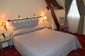 Hotels Auberge du Cheval Blanc : photos des chambres