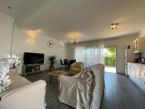 2 pièces en RDJardin avec 2 grands Terrasses