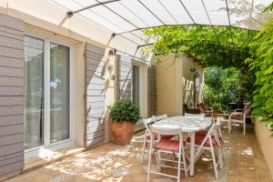 Maisons de vacances Superbe maison avec terrasse et piscine - Villeneuve-les-Avignon - Welkeys : photos des chambres