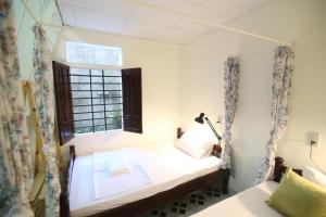 Phòng Đôi Loại Sang có Giường Phụ (Deluxe Double Room with Extra Bed)