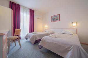 Hotels The Originals City, Relax'Otel & Spa, Le Barcares : photos des chambres