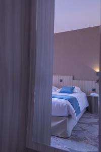 Hotels The Originals City, Relax'Otel & Spa, Le Barcares : photos des chambres