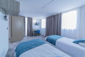 Hotels The Originals City, Relax'Otel & Spa, Le Barcares : photos des chambres