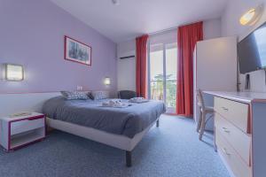 Hotels The Originals City, Relax'Otel & Spa, Le Barcares : photos des chambres