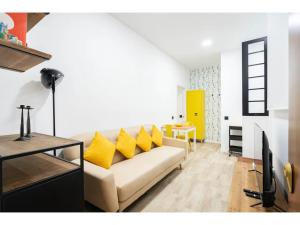 Apartamento amarillo en Atocha