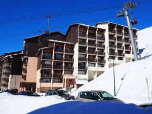 Appartement fonctionnel aux Menuires, proche des pistes avec balcon et garage - FR-1-344-1064