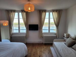 Appartements Vue et terrasse panoramique sur la Baie de Somme : photos des chambres