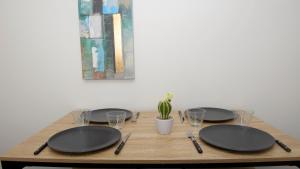 Appartements Dominici 2- CahorsCityStay- Parking Wifi Netflix : photos des chambres