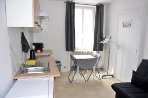 Appartements AU BORD DE L'EAU studio 1 : photos des chambres