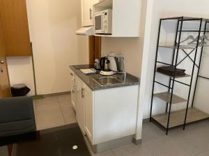 Appartements Studio 005 : photos des chambres