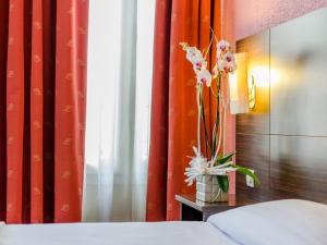Hotels Hotel Arc Paris Porte d'Orleans : photos des chambres