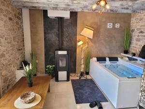 Villas Cottage chaleureux avec jacuzzi et terrasse privee : photos des chambres