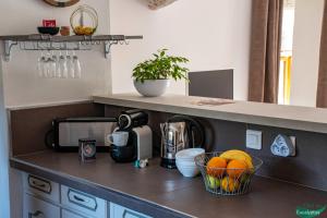 Appartements Le Clos des Eucalyptus : photos des chambres