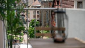 Appartements MAMA with aircon including a parking space at 300 meters : photos des chambres