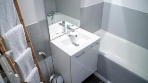 Appartements MAMA with aircon including a parking space at 300 meters : photos des chambres