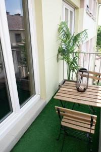 Appartements MAMA with aircon including a parking space at 300 meters : photos des chambres