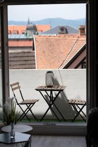 Appartements MAMA with aircon including a parking space at 300 meters : photos des chambres