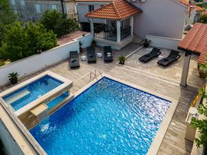Luxury Villa David with a private boat, heated pool, jacuzzi and sauna