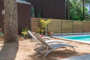 Maisons de vacances Charmante maison de plain pied avec piscine : photos des chambres