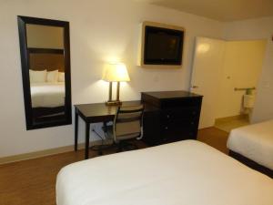Deluxe Room with Two Queen Beds Smoking room in Red Roof Inn Houston - Jersey Village