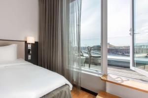 Standard Room with City View and Balcony room in Radisson Blu Hotel Uppsala