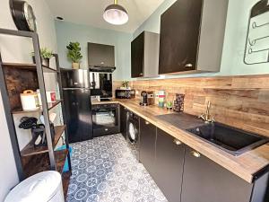 Appartements Maison de ville - Paris en 15 mn ! - 4 pers- 1 bebe - Vintage & Music ! : photos des chambres