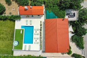 Dalmatian Sea-View Villa with Pool, Jacuzzi, Gym and Botanical Garden Near Trogir & Split