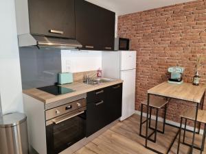 Appartements Logement de caractere en haute ville de Quimperle : photos des chambres