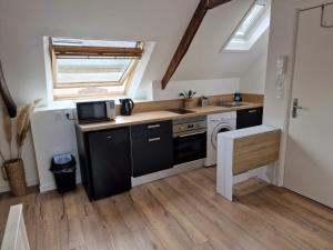 Appartements Logement de caractere en haute ville de Quimperle : photos des chambres