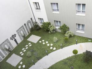 Hotels Kyriad Paris 18 - Porte de Clignancourt - Montmartre : photos des chambres