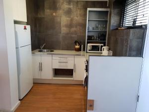 Studio 204 with harbour, ocean and sunset views from the balcony