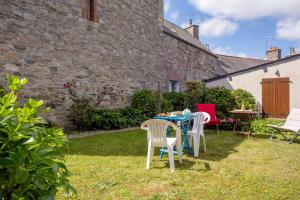 Appartements La Belle Epoque - maison en pierre avec jardin : photos des chambres