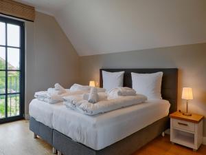 Reetland am Meer - Superior Reetdachvilla mit 2 Schlafzimmern F25