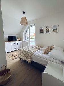 Ostrovia - pokoje nad morzem