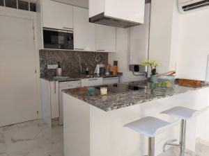 NIDO DEL AMOR deluxe 1a linéa Terraza Indoorpool Wifi Aire Netflix 10 metros a Cala del Pino