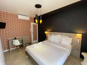 Hotels Logis Les Cols Verts : photos des chambres