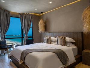 Habitat de O:live room in San Juan Water & Beach Club Hotel