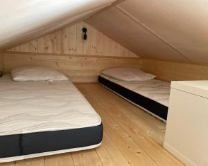 Tentes de luxe Tiny House LA RUCHETTE : photos des chambres