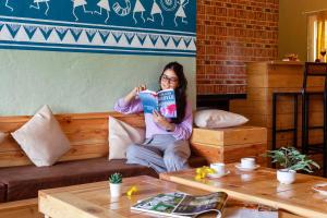 StayVistas Ficus Farms - Mountain-View Haven with Rustic Artsy Interiors, Outdoor Pool, Glasshouse, Home Theatre & Karaoke Delight