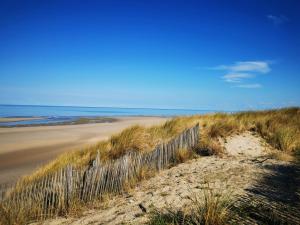 Appartements Appartement a quelques pas de la plage avec jardin : photos des chambres