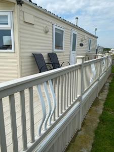 L25 L&g caravan hire 6 berth millfields family only and lead person must be over 30 MAX 4 ADULTS