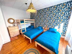 Maisons de vacances Gite cosy avec Jacuzzi classe 3 etoiles : photos des chambres