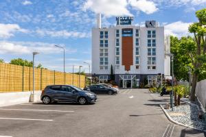 Hotels Kyriad Paris Ouest - Colombes : photos des chambres