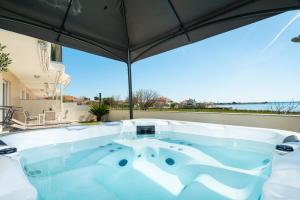 Crowonder Beachfront Reiterer Villa V1 with Jacuzzi 30 meters from the Beach