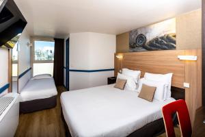 Hotels Kyriad Paris Ouest - Colombes : photos des chambres