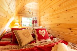 Chalets Cabane en bois avec bain nordique : photos des chambres