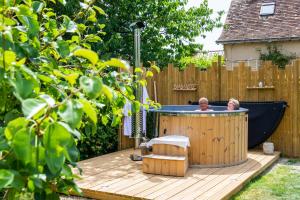 Chalets Cabane en bois avec bain nordique : photos des chambres