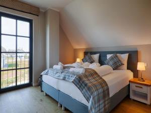 Reetland am Meer - Premium Reetdachvilla mit 3 Schlafzimmern, Sauna und Kamin F19